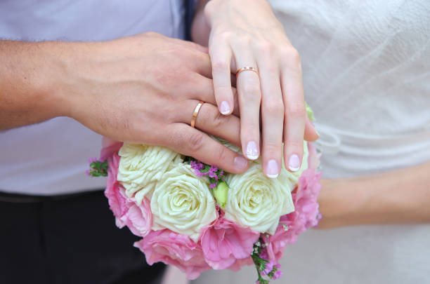 istock Hands of newlywedses 862646178