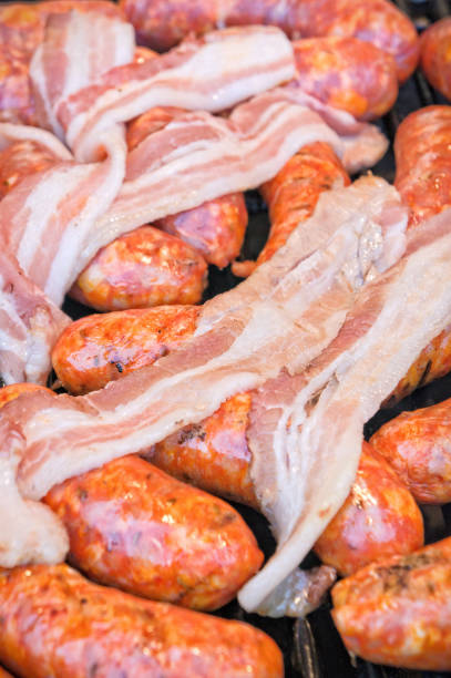 istock Sausages and bacon slices 862646968