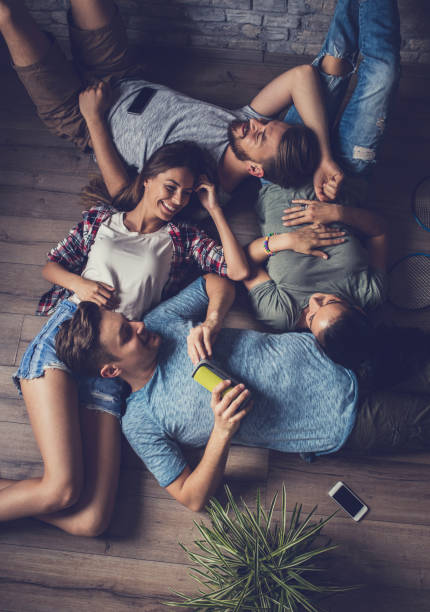 istock Above view of relaxed people communicating on parquet floor. 862650716