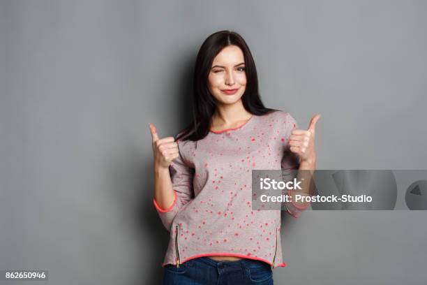 Young Beautiful Woman With Thumb Up Portrait Stock Photo - Download Image Now - Women, Thumbs Up, OK Sign