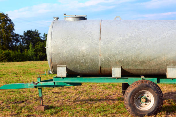 istock Water trough for drinking for cow cattle in field 862653906