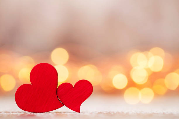istock Red hearts on the wooden background. 862654648