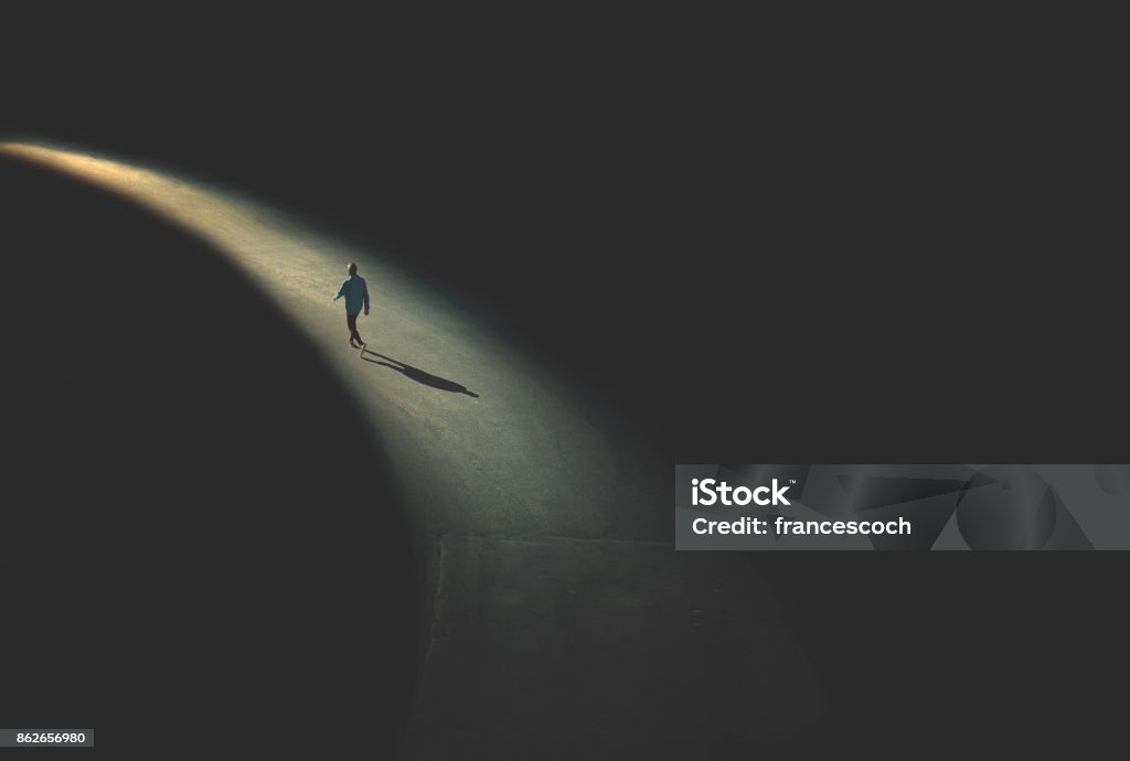 man walking in the night Loneliness Stock Photo