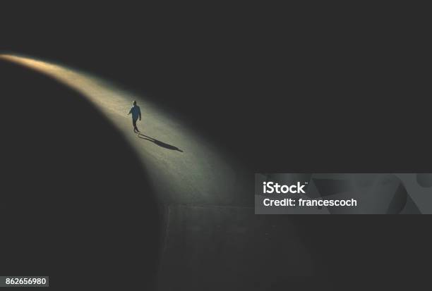 Man Walking In The Night Stock Photo - Download Image Now - Loneliness, One Person, Footpath