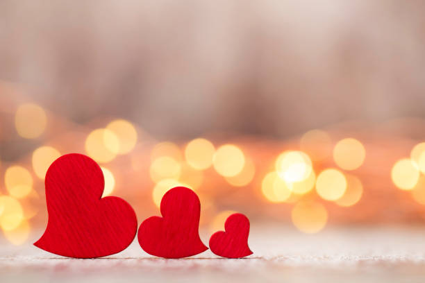 istock Red hearts on the wooden background. 862657622
