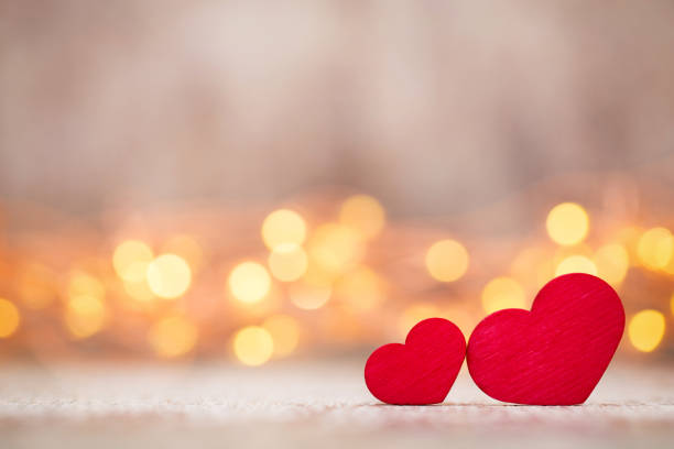 istock Red hearts on the wooden background. 862657808