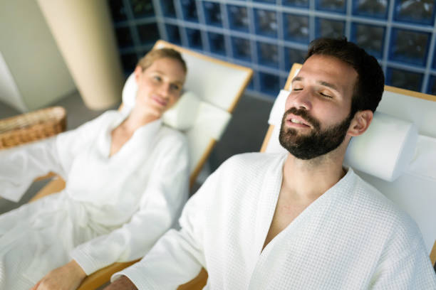 istock Handsome man and beautiful woman relaxing in spa 862671032