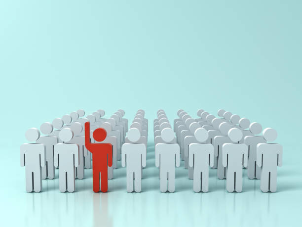 istock Stand out from the crowd and different creative idea concepts , One red man raising his hand among other white people on green pastel color background with shadows and reflections . 3D rendering 862671084