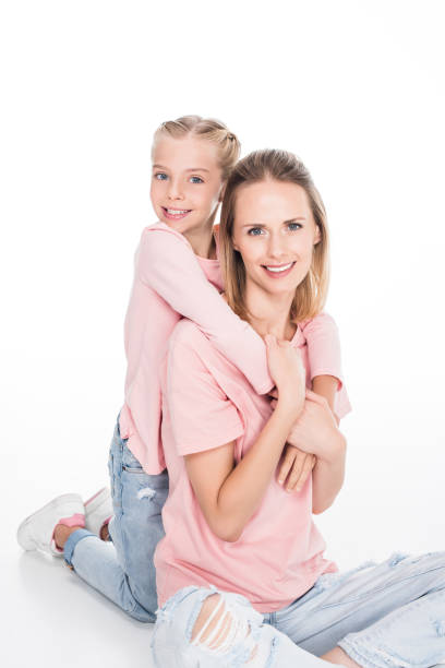 istock daughter and mother embracing together 862672642