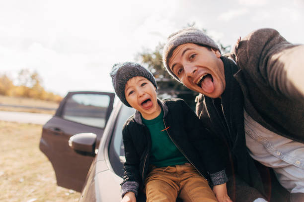 istock Father and son after Christmas tree quest 862675406