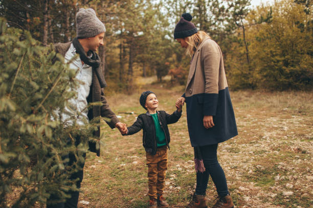 istock Family in a Christmas tree quest 862679210