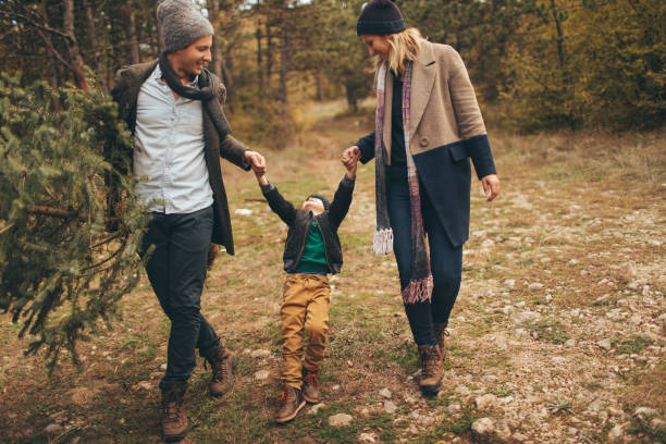 istock Family in a Christmas tree quest 862679320