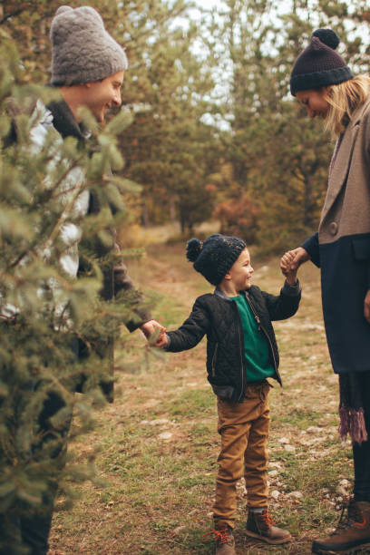 istock Family in a Christmas tree quest 862679424