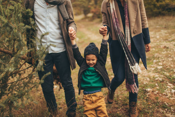 istock Family in a Christmas tree quest 862679666