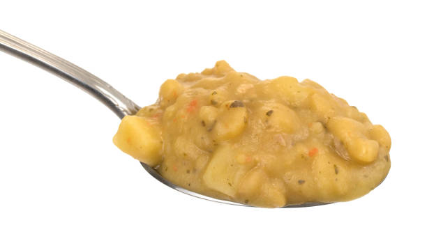 istock Spoonful of yellow split pea and vegetable soup 862683304