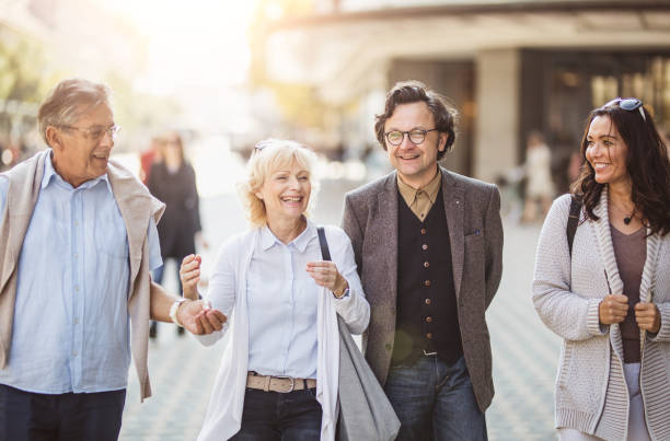 istock Mature Couples Walking Around Old Town 862684196