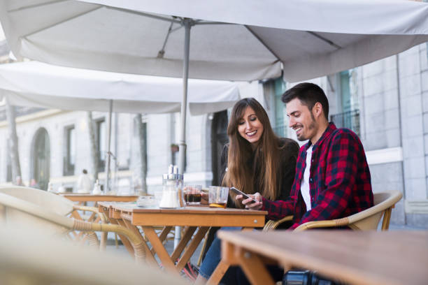 istock young couple sitting at a terrace 862684744