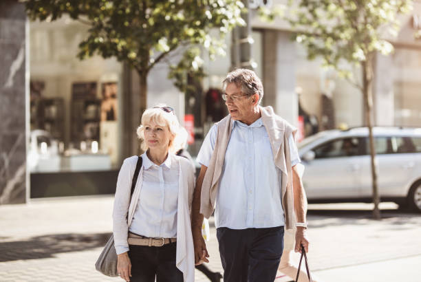 istock Senior Couple Walking Around Old Town 862684876