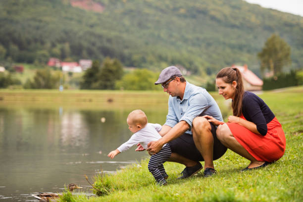 istock Happy family in nature in summer. 862688122