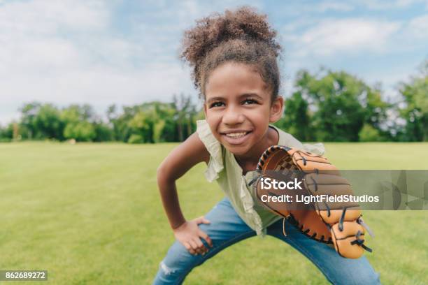 Child Playing Baseball In Park Stock Photo - Download Image Now - Child, Baseball - Sport, Playing