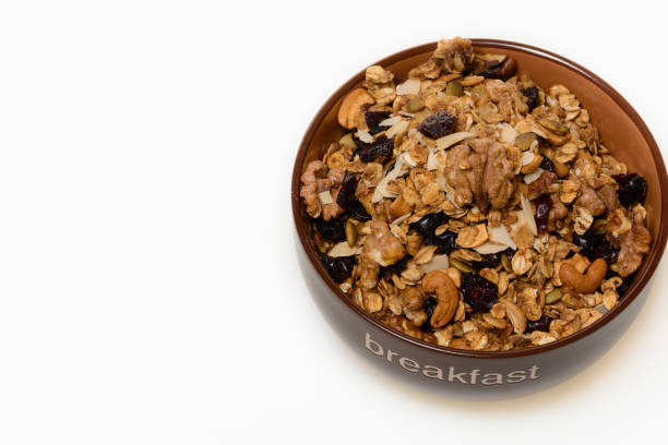 istock Breakfast: Bowl of whole grain muesli isolated on white background 862689802