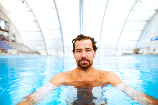 istock Man in the indoor swimming pool. 862690116