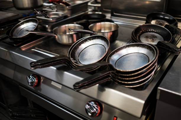 istock Metal black pans on restaurant kitchen 862690292