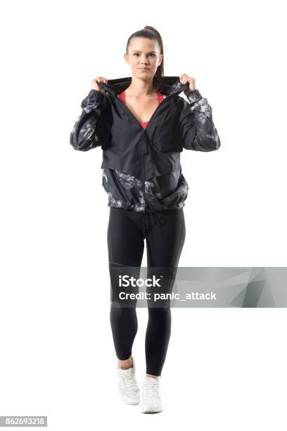 Smiling Young Active Sporty Female Jogger In Warm Autumn Sportswear Stock Photo - Download Image Now