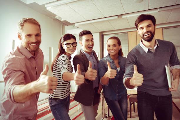 istock Positive happy people showing thumbs up gestures 862693702