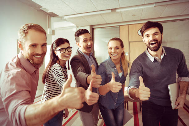 istock Positive young team showing OK gestures 862693922
