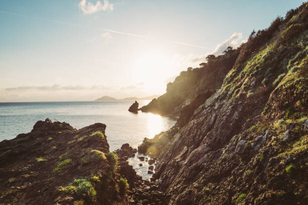istock Man hiking on a mountain over the sea 862704592