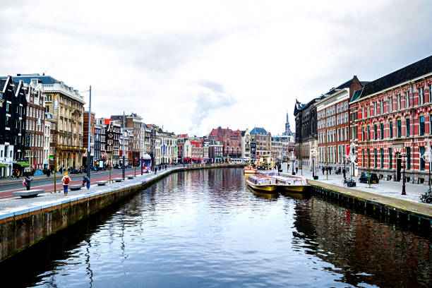 istock Amsterdam canals and typical houses 862707274