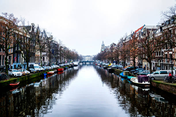 istock AMSTERDAM, THE NETHERLANDS - FEB 6, 2017: Amsterdam canals and typical houses 862708286