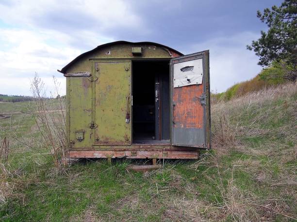 istock Open old army caravan on to the meadow 862708742