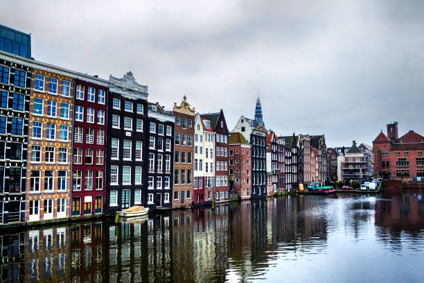 istock Amsterdam canals and typical houses 862712458