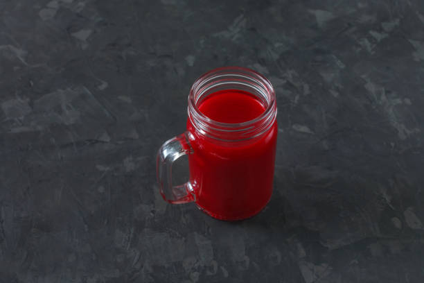 istock Natural detox beetroot smoothie on black background 862716262