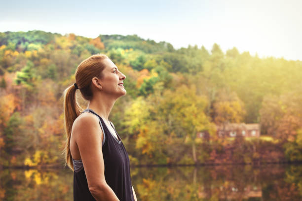istock Woman Enjoying Beautiful Fall Day 862717286