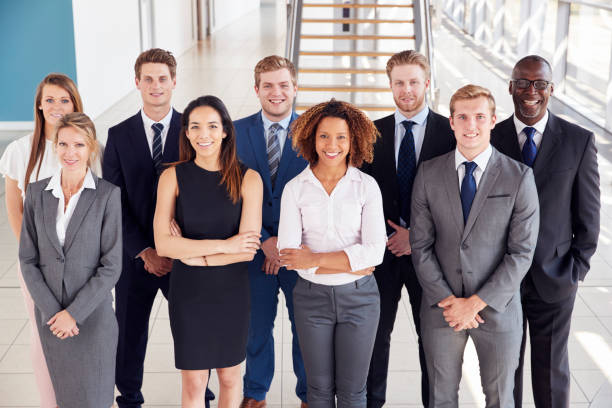 istock Office workers in a modern lobby, group portrait 862717428