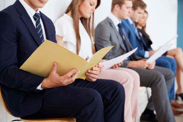 istock Candidates waiting for job interviews, mid section 862718232