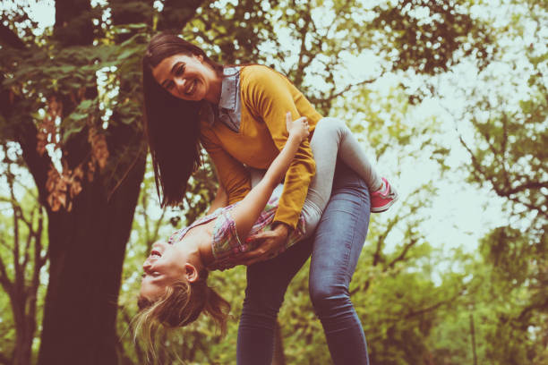 istock Mother playing with daughter in nature. On the move. 862721820