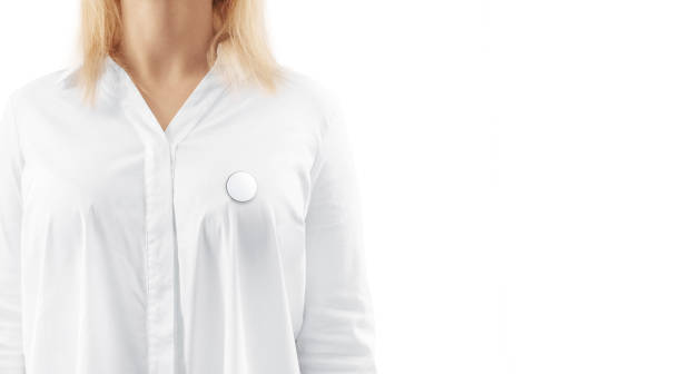 blank white round silver lapel badge mockup on woman chest - lapel imagens e fotografias de stock