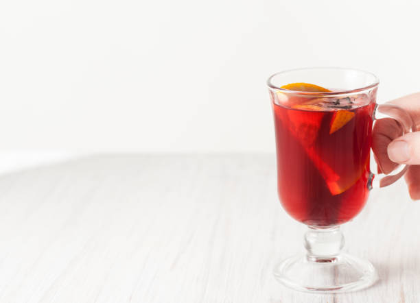 istock A glass of mulled wine on white wooden table 862729530