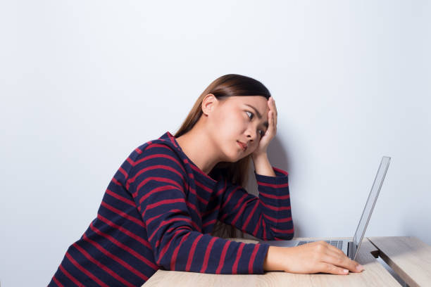istock Woman has head pain from work 862732236