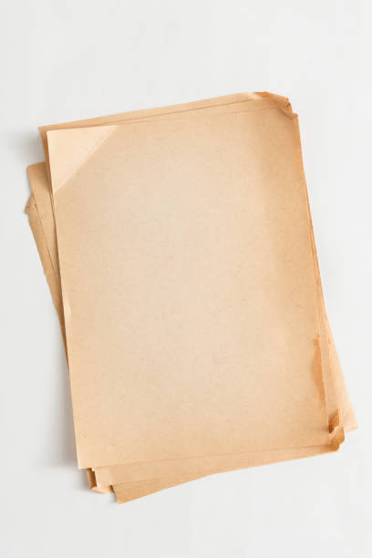 istock old craft paper sheets pile isolated on white background 862732338