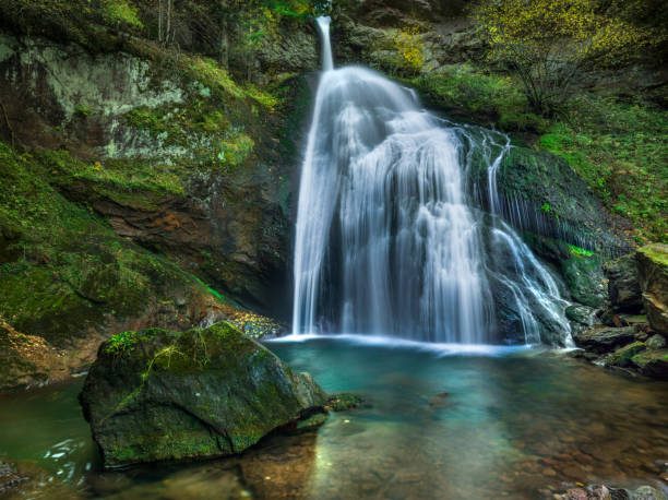 istock Beautiful mountain waterfall in the Italian Alps 862733374