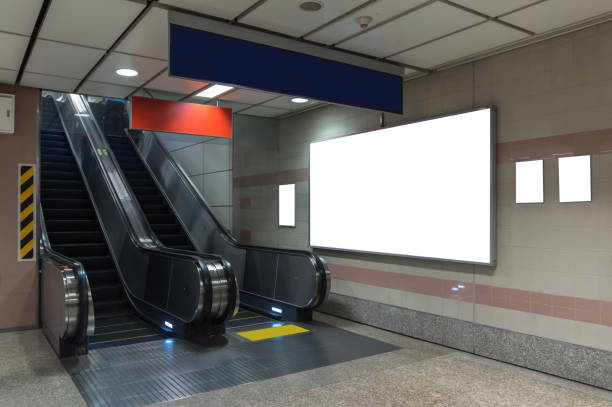 istock Blank billboard located in underground hall or subway for advertising, mockup concept, Low light speed shutter 862736130