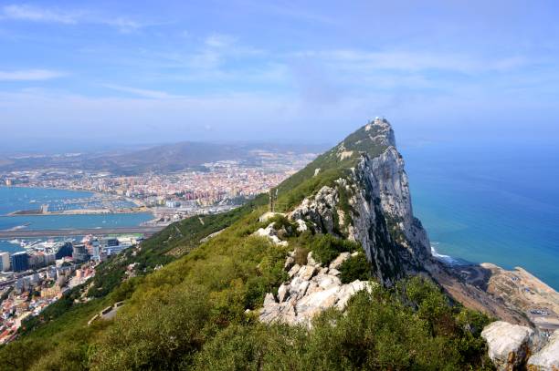 Gibraltar - view from the crest of the Rock - panorama Gibraltar: view from the crest of the Rock, the town, the airport, Spain and the East Side near Catalan Bay - Upper Rock Nature reserve - photo by M.Torres gibraltar photos stock pictures, royalty-free photos & images