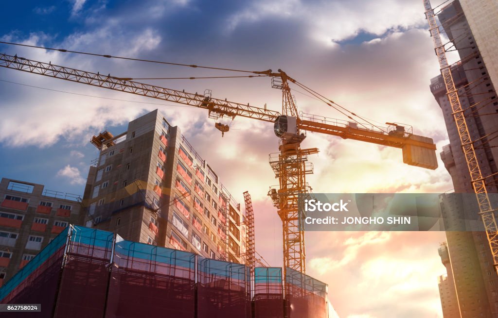 Construction site Construction Industry, Industry, Building - Activity, Construction Frame, Sunset Construction Industry Stock Photo