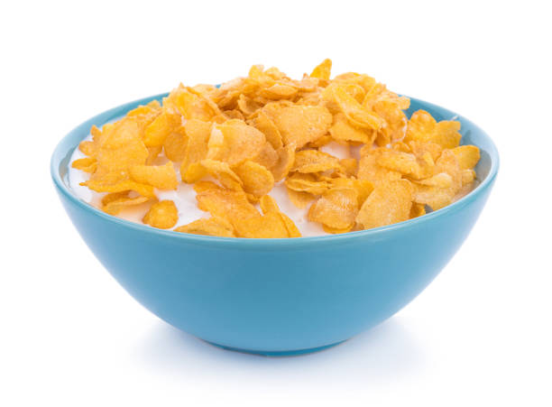 istock Corn flakes with milk in bowl isolated 862758660