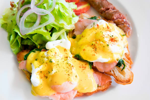istock Egg benedict with smoked salmon, sauce, and grill hot dog 862759190